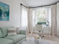 Light & Airy Sitting Room Features Mint Green Sofa & Office Nook