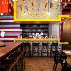 Rustic Mexican Restaurant with Yellow Bar and Reclaimed Wood Floors