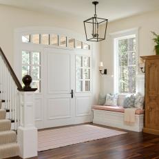 Contemporary White Foyer with Storage Bench and Armoire