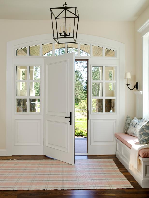 White Contemporary Foyer With Window Surrounded Front Door And Plaid Rug Hgtv