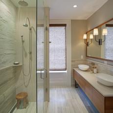 Neutral Master Bath With Wood Vanity, Vessel Sinks