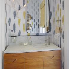 White Powder Room With Gray and Yellow Feather Wallpaper