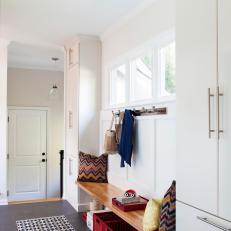 Long, Contemporary Mudroom With Geometric Area Rug