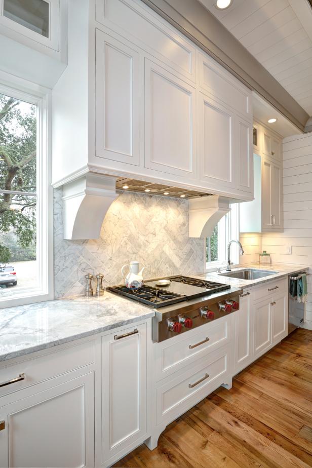 Coastal-style Kitchen with Reclaimed Wood Floors and ...