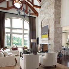 Neutral Traditional Living Room With Stone Fireplace