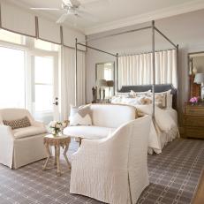 Gray and White Transitional Bedroom With Seating Area