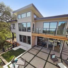 Modern Home With Concrete Tile Grid Backyard
