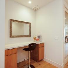 Modern Hallway Nook With Thin White Countertop, Barstool and Horizontal Mirror