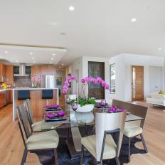 Open, Contemporary Dining Room With Hot Pink Table Setting