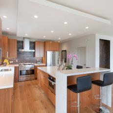 Modern Kitchen With Wood Cabinetry and Large Island