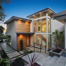 Modern Home Exterior With Extensive Concrete Walkway