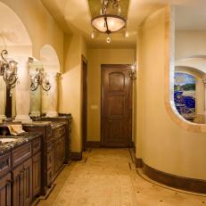 Neutral Mediterranean Spa Bathroom With Sconces