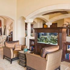 Neutral Mediterranean Seating Area With Fish Tank