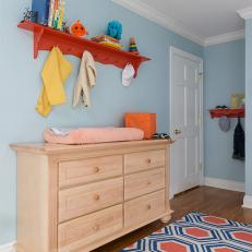 Chic Changing Table in Contemporary Blue Nursery