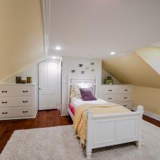 Teen Bedroom With Sloped Ceiling & White Furnishings