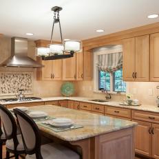 Contemporary Kitchen with Light-colored Wood Cabinets and Kitchen Island