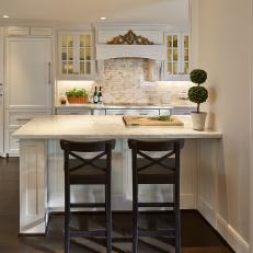 Transitional Kitchen With Marble Backsplash & Countertops