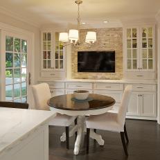 Eat-In Kitchen With Glass-Front Cabinets & Table for Two