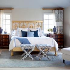 Blue and White Transitional Bedroom With Stools