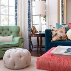 Tufted Ottoman and Green Armchair