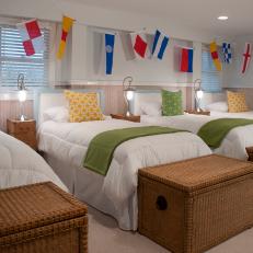 Coastal Kids' Bedroom With World Flags Banner