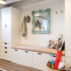 White Contemporary Mudroom With Built-In Upholstered Bench