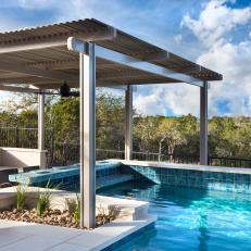 Sparkling Turquoise Swimming Pool With Pergola
