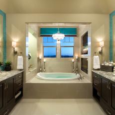Beige and Blue Main Bathroom With Bathing Nook