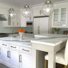Bright, Transitional Kitchen With Marble-Topped Island