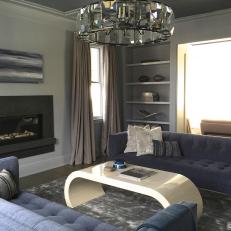 Contemporary Living Room Features Gray and Navy Tones