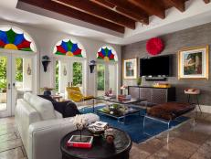 Eclectic Family Room With Exposed Beams