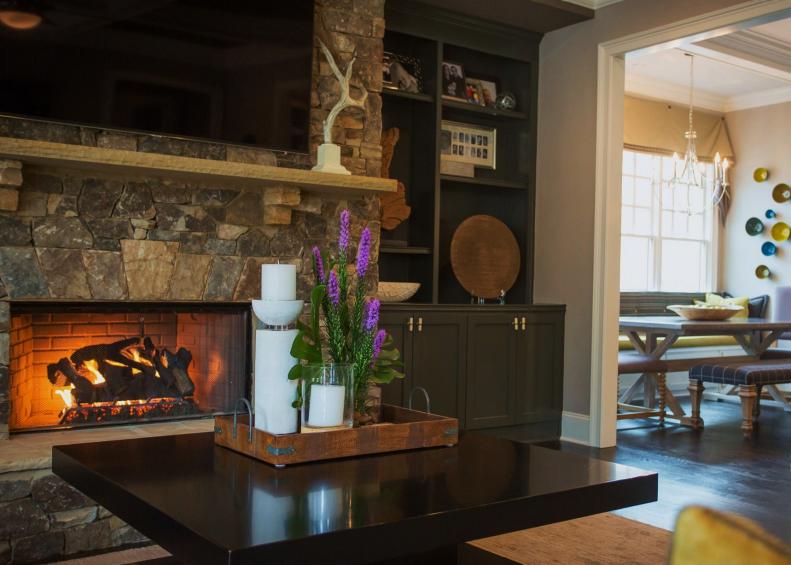 Stone Fireplace and Gray Bookshelves