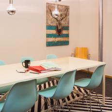 Multicolored Eclectic Conference Room With Blue Chairs