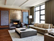 Neutral Contemporary Living Room With Gold Fireplace