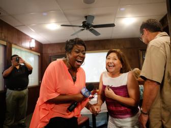 HGTV Host, Tiffany Brooks, surprises Isabel Villarreal, winner of the HGTV Smart Home 2015, in Harlingen, TX, on Wednesday, July 8. The grand prize features an approximately 2,300 square- foot residence and all its furnishings in Austin, TX, a 2015 Mercedes Benz C-Class and $100,000 cash prize provided by national mortgage lender Quicken Loans.