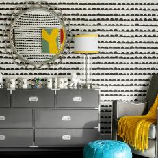 Playful Midcentury Modern Nursery Features Gray Furnishings & Yellow Accents