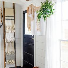 Front Entry With Makeshift Mudroom, Hanging Stick and Ladder Shelf