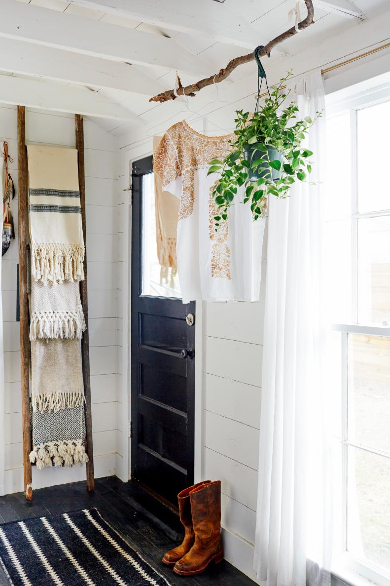 White Country Mudroom With Black Front Door
