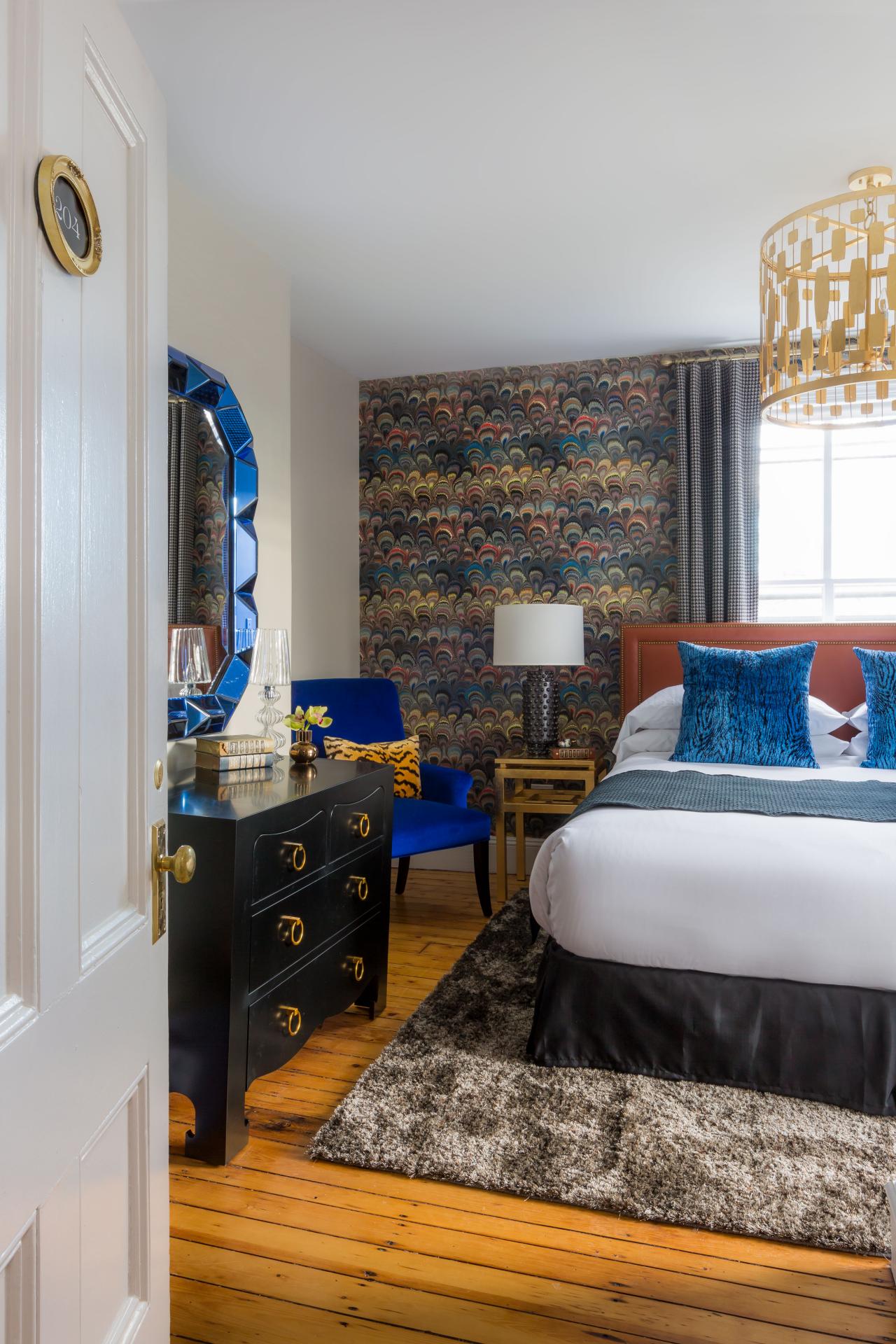 Eclectic Bedroom With Royal Blue Accents Feather Design Accent