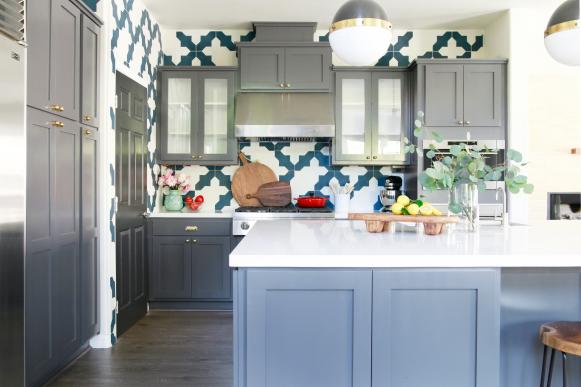 Kitchen With Blue & White Tile Backsplash & Gray Cabinets