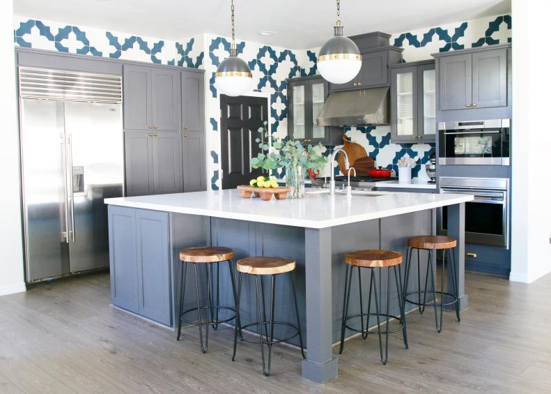 Kitchen With Wood Stools, Gray Island & Cabinets