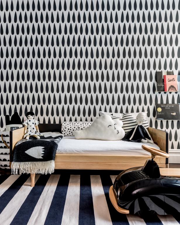 Playful Children's Room with Bold Wallpaper