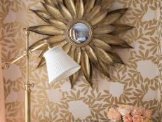 Bedroom Detail of Gold Wallpaper, Mirror & White Dresser