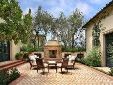 Mediterranean Outdoor Room With Fireplace