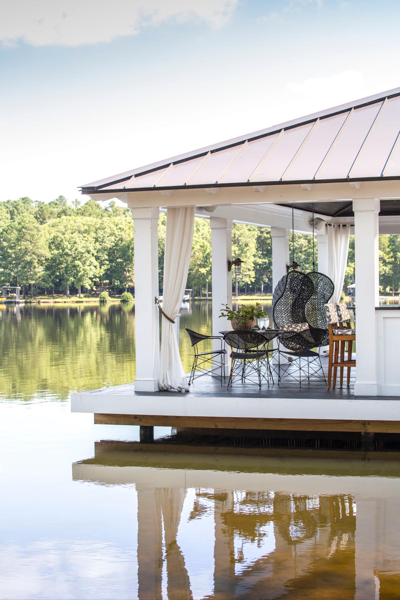 View of Swings &amp; Dining Area on Elevated, Lakeside Deck | HGTV