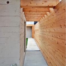 Concrete Walkway & Cedar Siding