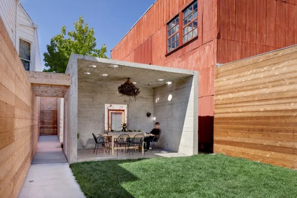 Modern Concrete Patio With Dining Area