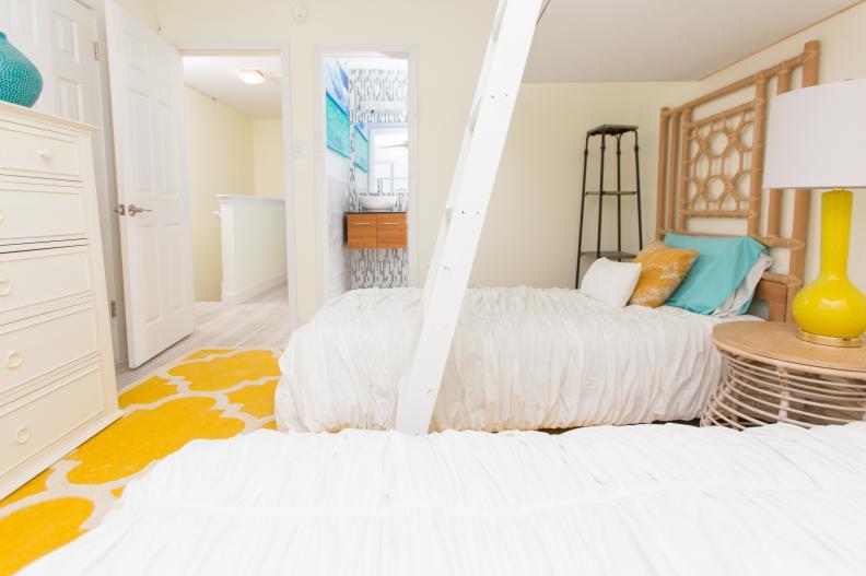 Coastal Bedroom With Yellow Rug 