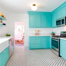 Blue and White Kitchen With Mosaic Tile Floor