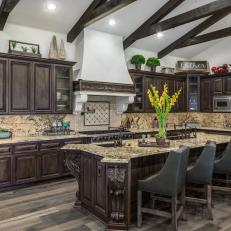 Gorgeous Mediterranean Eat-In Kitchen Features Dark Stained Cabinetry